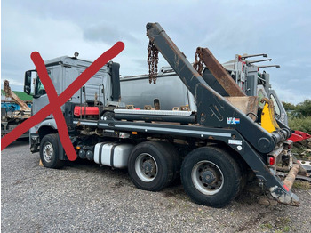 Skip loader truck